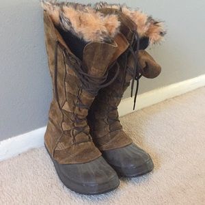 Tall leather lace up Sorel boots